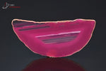 Tranche d'Agate teintée rose du Brésil (demi-cercle, bande translucide centrale) - 20 g / BD394 - Vignette | 1001 minéraux