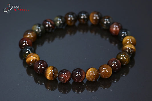 Bracelet bijou avec les 3 yeux : tigre, faucon et taureau d'Afrique du sud