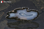 Tranche d'Agate teintée noire du Brésil (allongée, large bordure noire, centre translucide incolore) - 26 g / BH772 - Vignette | 1001 minéraux