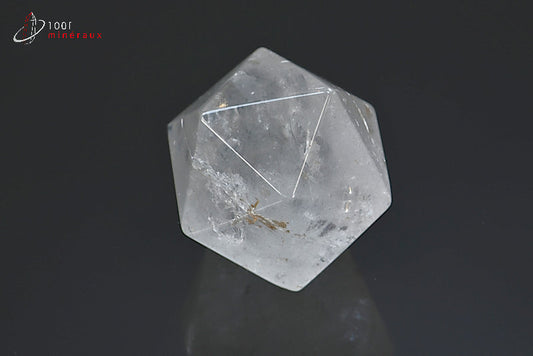 Minéral taillé en forme d'icosaèdre en cristal de roche