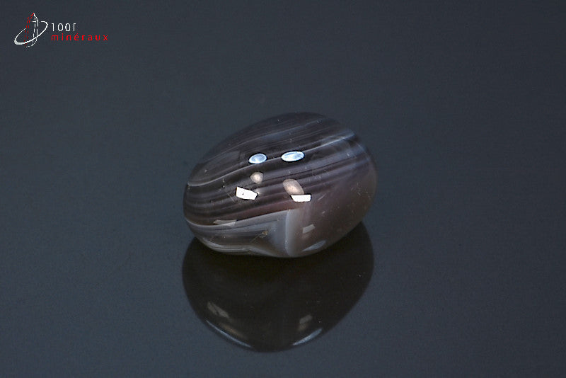 Agate zonée Botswana - Détail des cercles blancs, gris et noirs sur fond gris et brun - 10 g
